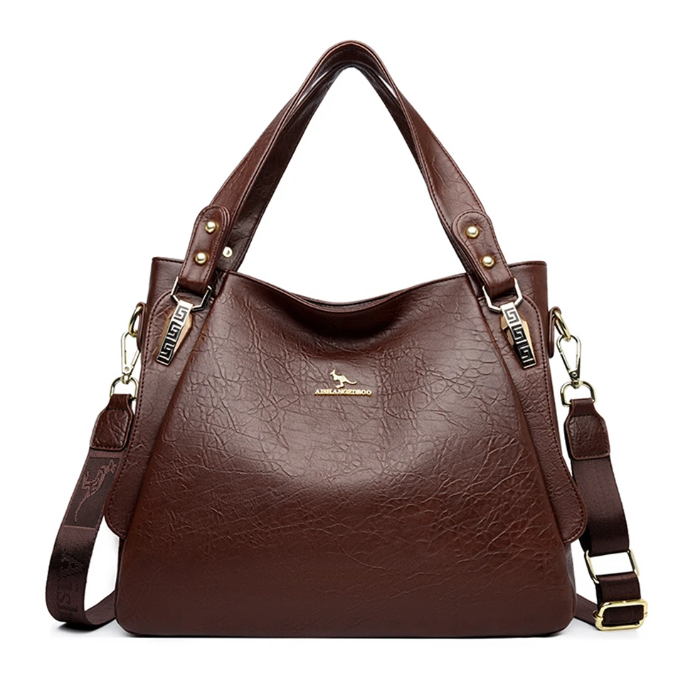 sac à main en cuir marron structuré et pratique